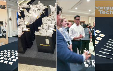 Students at a table with marketing materials