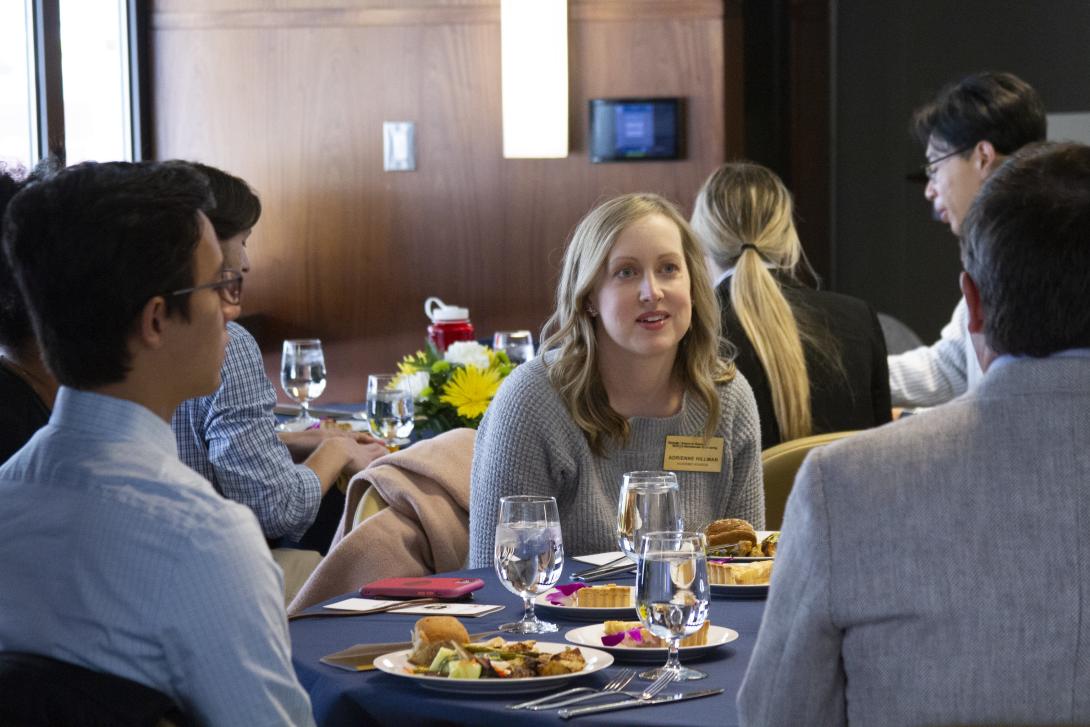 students eating lunch around a table