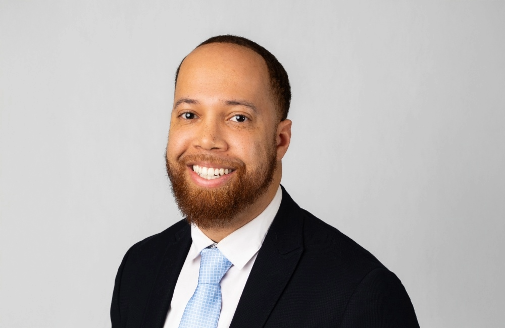 Headshot of Evan Burnett.